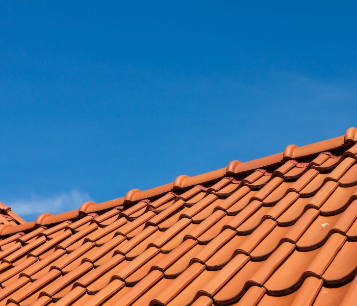 roof tile pattern over blue sky